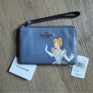 Coach Blue Wristlet with Cinderella Design